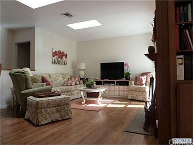 Living Room includes fireplace and French doors to