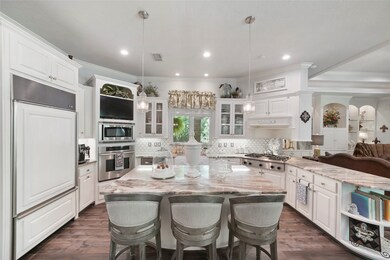 KITCHEN  Freshly renovated with crisp white cabine
