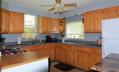 Newly painted kitchen with gas stove, oven, dishwa
