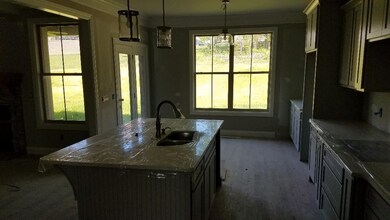 View of breakfast nook - French doors lead to covered patio. (not actual home for sale.)