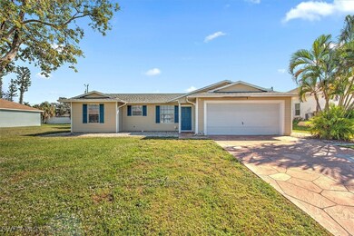 Single story home featuring an attached garage, a