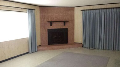 Florida Room w/ Wood-burning Fireplace