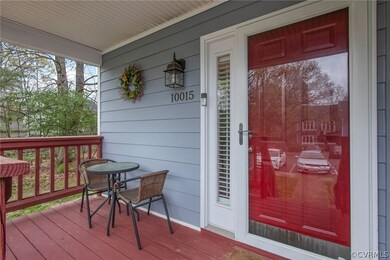 Property entrance with covered porch