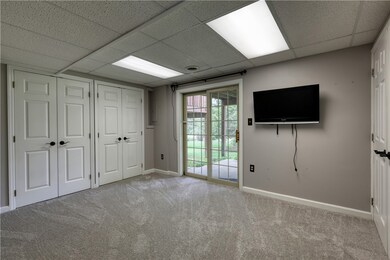 Closets provide extra storage space in this room o
