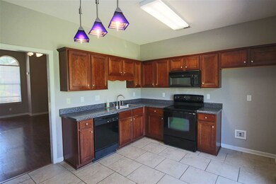 Updated Kitchen with Beautiful Cabinets.