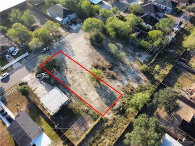 Aerial perspective of suburban area with property parcel outlined