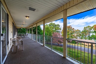 Porch runs length of the house