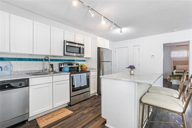 White cabinets & marbleCountertops
