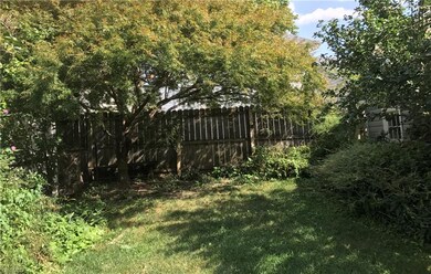 This is the backyard that offers privacy and a park-like serene setting.