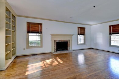 Main Living room of entry foyer with fireplace and
