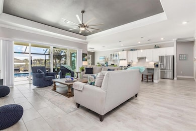 Huge family room with tray ceiling with accent paint