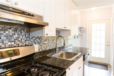 The newly added backsplash gives the kitchen the p
