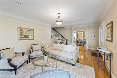 Formal LR w/ fireplace leads to new side porch.