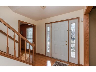 Foyer with hardwood floors