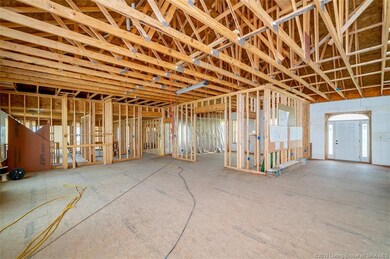 VIEW OF LIVING ROOM, OFFICE & FOYER FROM KITCHEN..