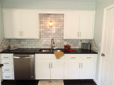 Kitchen with granite countertops.