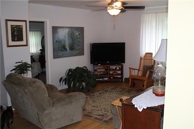 Spacious living room with laminate wood flooring