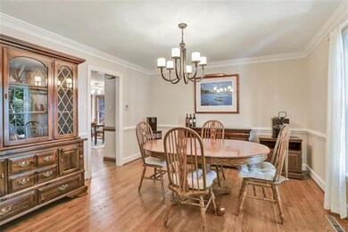 Dining room with kitchen door to the left
