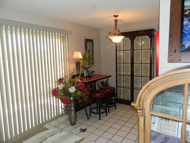 Breakfast nook and sliding glass door to