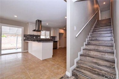 Stairs to 3 bedrooms upstairs