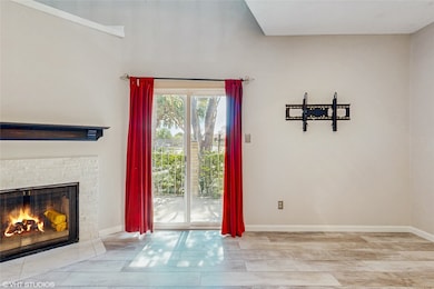 This is a charming townhouse with a brick exterior
