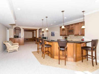 Basement. Huge basement features wet bar, separate home theater, exercise room, and full bath!