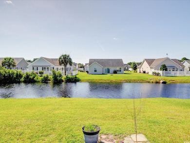 Water view featuring nearby suburban area