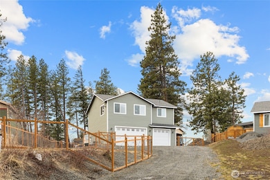 Fully fenced and move in ready with a 3 car garage!