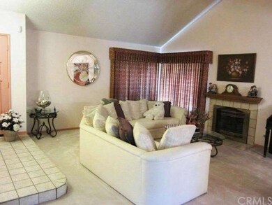 Another view of living room looking to front windo