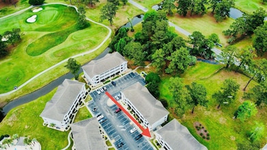 Aerial view of a golf club and a large body of water