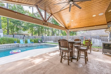 Expansive covered patio with built-in surround sou