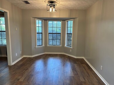 Dining area with bay window.