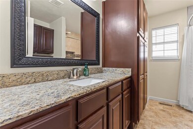 Bathroom featuring vanity