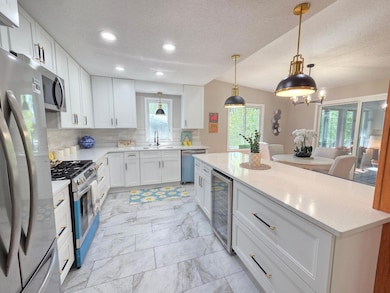 12209 Woodbine Rd, Hopkins, MN 55305 - photo 2