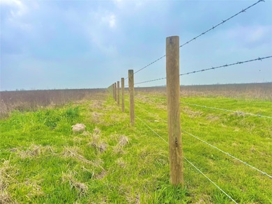View of yard with a rural view