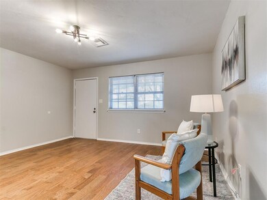 Living area featuring light hardwood / wood-style 