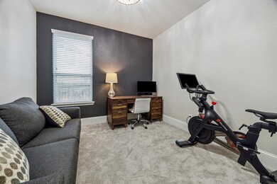 Currently used as a home office and fitness area, the possibilities for this space are endless!