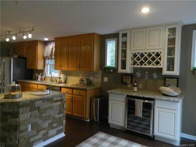 Large kitchen with upgrades. Stainless steel refri