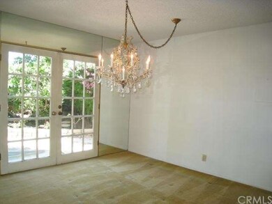 FORMAL DINING ROOM OVER LOOKING BACK YARD