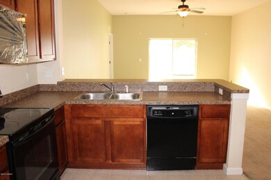 Sink and Breakfast Bar Area