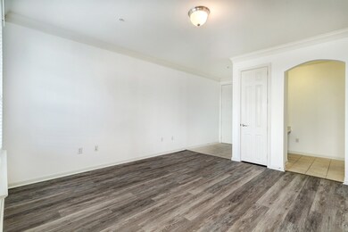 View of Living area toward the front entry, coat c