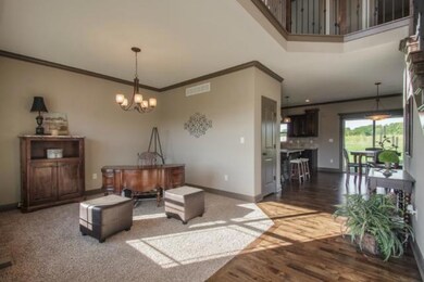 Front foyer is wooden floors.  Living room or an o