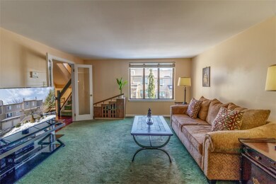 Very nice size bright living room with glass frenc