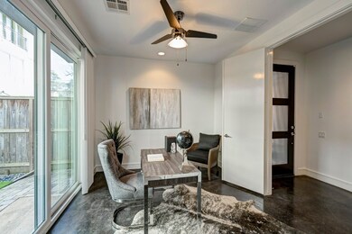 Downstairs bedroom/home office with french doors a