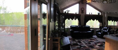 Living room and XL deck off dining room