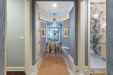 Gallery Foyer & Powder Room on the right