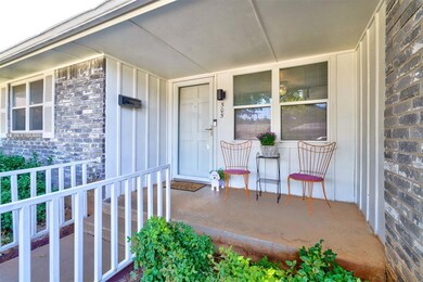 Covered front porch welcomes you home.