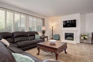Custom Plantation Shutters and Inviting Fireplace