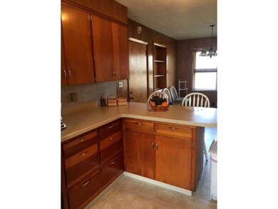 Kitchen opens to Dining area