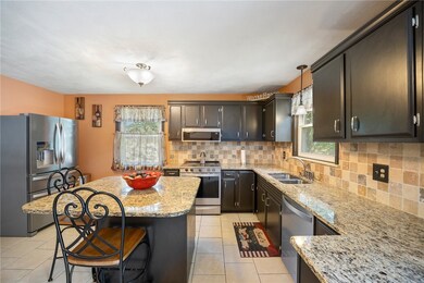 Gourmet kitchen with center island.